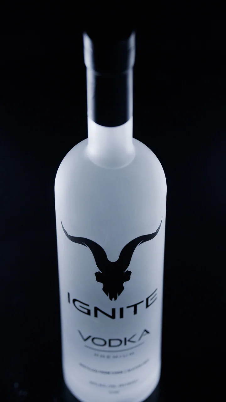 IGNITE Vodka, bottle on a black background